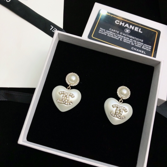 "Regal Rosettes: Rose Gold Statement Earrings by CHANEL" - Picture 2 of 8